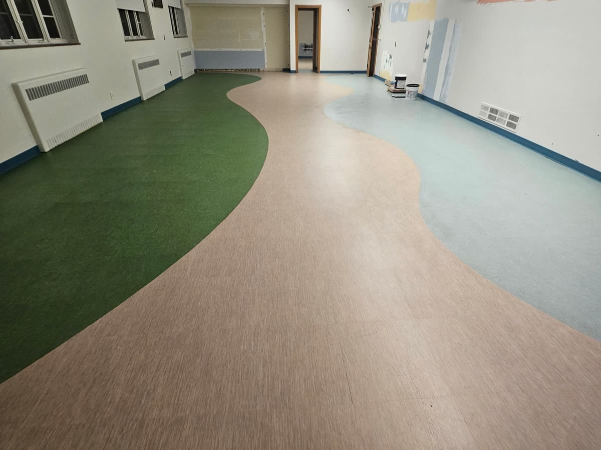 Sheet vinyl classroom with green and tan color fields