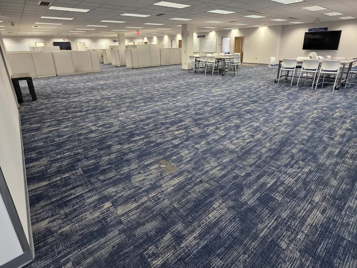 Open office with blue patterned carpet tile