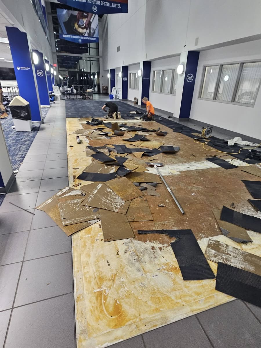 Old carpet coming up in an atrium